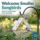Modern Mosaic Fly-Through Bird Feeder in mirrored diamond shown hanging in a garden with small songbirds perching and feeding. Open fly-through design provides room for birds to comfortably perch and access the seed.