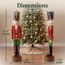 Dimensions diagram for the red and green Kristoff Christmas Nutcracker showing a 37.5-inch height, 9-inch width, and 7.5-inch depth, displayed beside a decorated Christmas tree for scale.