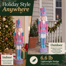 Pink Kristoff Christmas Nutcracker shown in indoor and covered outdoor holiday settings. Lightweight 6.6-pound design is easy to move and reposition for seasonal displays.