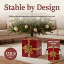 Pretty Present Decorative Christmas Tree Base shown supporting an artificial Christmas tree, featuring a wide, stable design and substantial 13.8-pound base for a sturdy foundation.