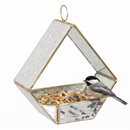 Modern Mosaic Fly-Through Bird Feeder in mirrored diamond filled with birdseed, with a small black, white, and gray songbird perched on the edge of the open feeder.