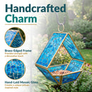 Modern Mosaic Fly-Through Bird Feeder in blue shown hanging in a garden, featuring a brass-edged frame and hand-laid mosaic glass for a decorative artisan-style design.