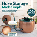 Copper Embossed Panel Hose Pot shown storing a coiled garden hose, featuring a 100-foot hose capacity, 2-inch side opening for easy spigot connection, and three drainage holes to help reduce water buildup.