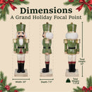 Dimensions infographic for a green and red Christmas nutcracker statue showing front, side, and back views. The statue measures 33 inches high, 10 inches wide, 7.5 inches deep, and weighs 7.2 pounds.