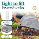 Infographic showing a lightweight gray faux rock cover being lifted over a sprinkler valve in a landscaped garden. Text highlights its 4.2 lb weight, two included 12-inch metal stakes, and built-in stake holes for secure outdoor placement.