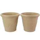 Two cream-colored decorative planters with raised floral scroll designs and rounded rims, shown side by side.