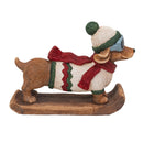 Sunnydaze 15" Playful Pup Winter Dachshund Statue on Sled in Sweater
