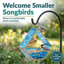 Modern Mosaic Fly-Through Bird Feeder in blue shown hanging in a garden with small songbirds perching and feeding. Open fly-through design provides room for birds to comfortably perch and access the seed.